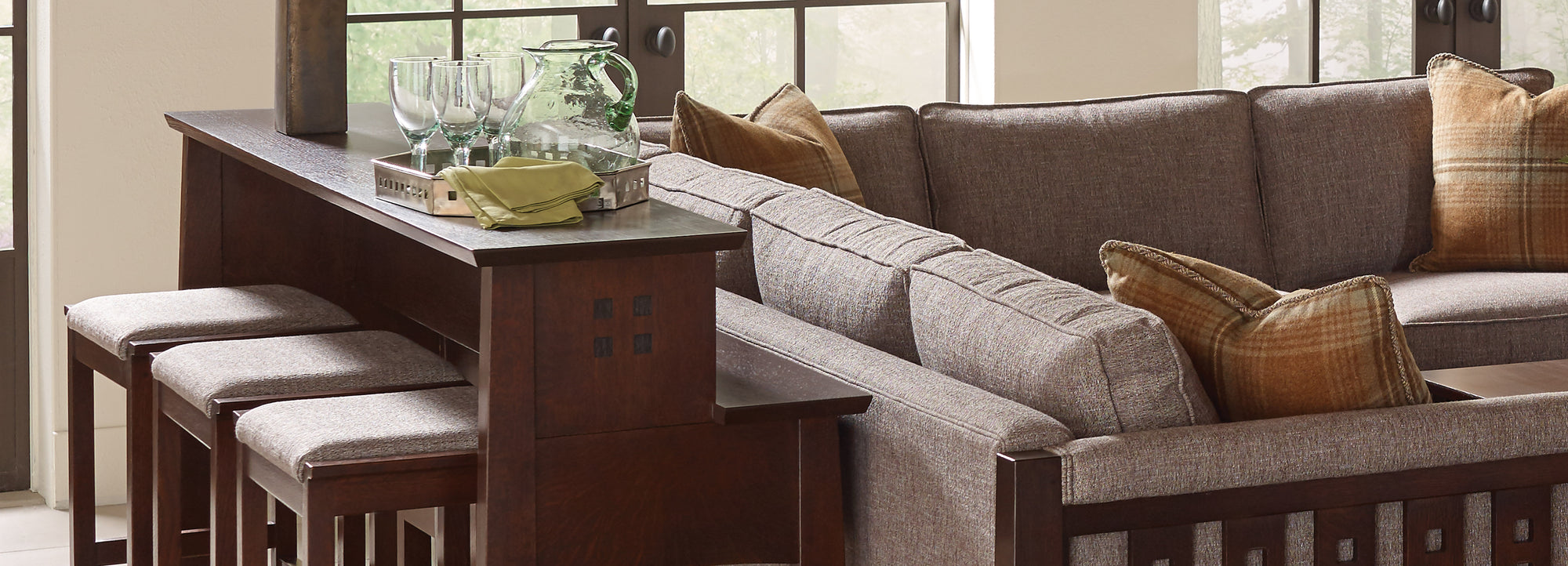 Stickley Furniture Gathering Island against gray sectional