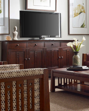 Lifestyle showcasing the Highlands Entertainment Console with matching accent chair and cocktail table