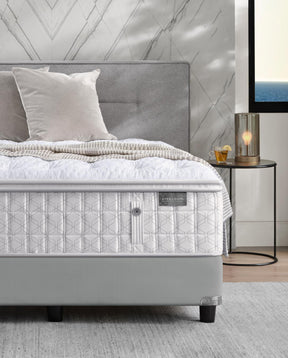 Aireloom mattress on top of a gray bed frame