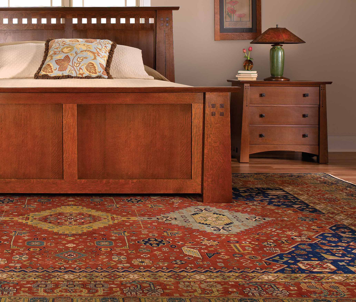 Lifestyle of an Anatolia Rug in the rust color with a Highlands bed sitting on top of it