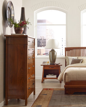 Stickley Pasadena Bungalow bedroom set featuring tall dresser, nightstand, and bed frame