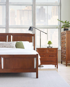 Lifestyle of the Pasadena Bungalow Sleigh Bed with an Inglewood Nightstand and Brookside Tall Chest to the right of it