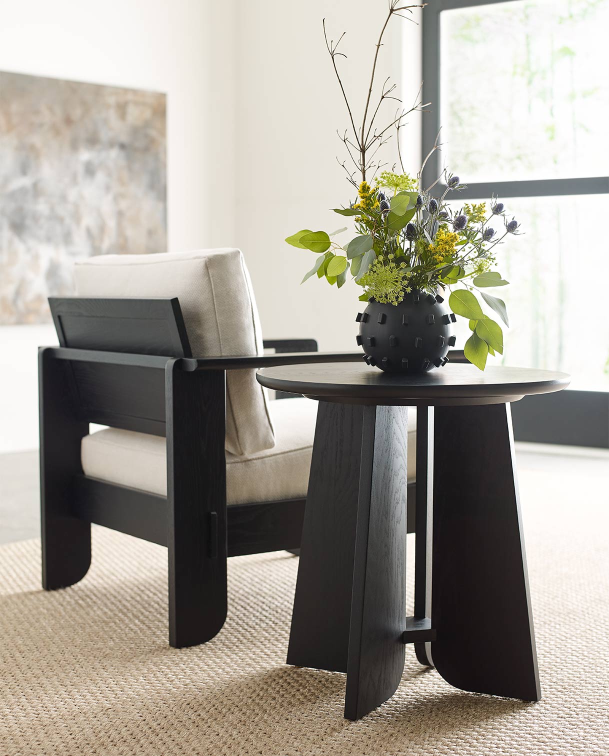 Lifestyle of Dearborn end table and Wood-Frame lounge chair